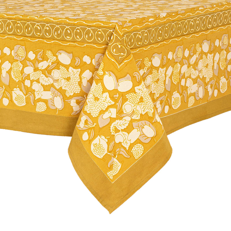 Caravan Home | 59 x 86 Forest Harvest Grey & Mustard Tablecloth features hand-printed fruit and vine designs, perfect for enhancing any dining setting.