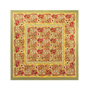 Caravan Home's 59 x 86 Red & Green Tablecloth features a vibrant floral pattern, handprinted on French linen, perfect for adding elegance to any dining setting.