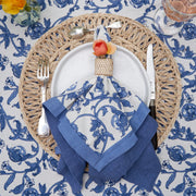 Caravan Home | 21 x 21 Lake Everyday Napkins Set of 4 on a plate with a fork, showcasing exquisite craftsmanship and soft linen texture.