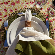 Caravan Home 21 x 21 Ivory Everyday Napkins Set of 4, displayed elegantly on a dining plate, embodying refined craftsmanship and luxurious texture.