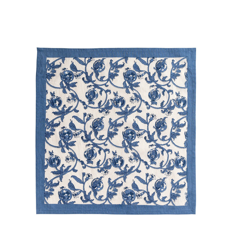Caravan Home 19 x 19 Granada Cornflower Blue Napkins Set of 6, featuring a hand-printed floral pattern with cornflower blue pomegranates on white fabric.