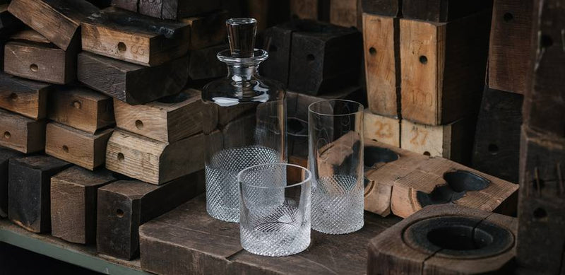 Richard Brendon | Diamond Highball glass bottle and two textured glasses, featuring a contemporary diamond cut design, ideal for cocktail enthusiasts.
