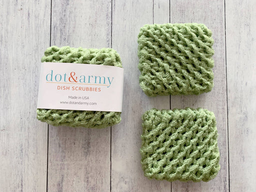 Dot and Army | Dish Scrubbies - olive, intricately knitted for durability, ideal for eco-friendly cleaning, featured in a set of two green scrubbers.