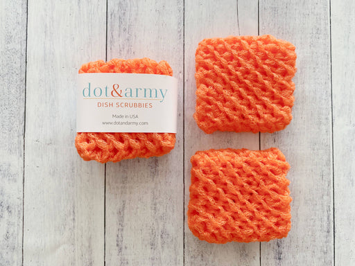Dot and Army | Dish Scrubbies - orange, a set of two handmade, durable nylon scrubbies designed for effective, eco-friendly cleaning, displayed on a plain background.