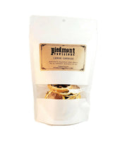 Piedmont Provisions | Dried Fruit Cocktail Garnishes - Lime: A bag of dehydrated lime slices, perfect for enhancing cocktails and culinary creations, from Athens Cooks' specialty food collection.