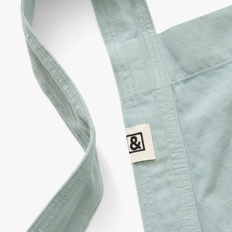 Hedley & Bennett Pinafore Apron, Eggshell Blue — construction detail