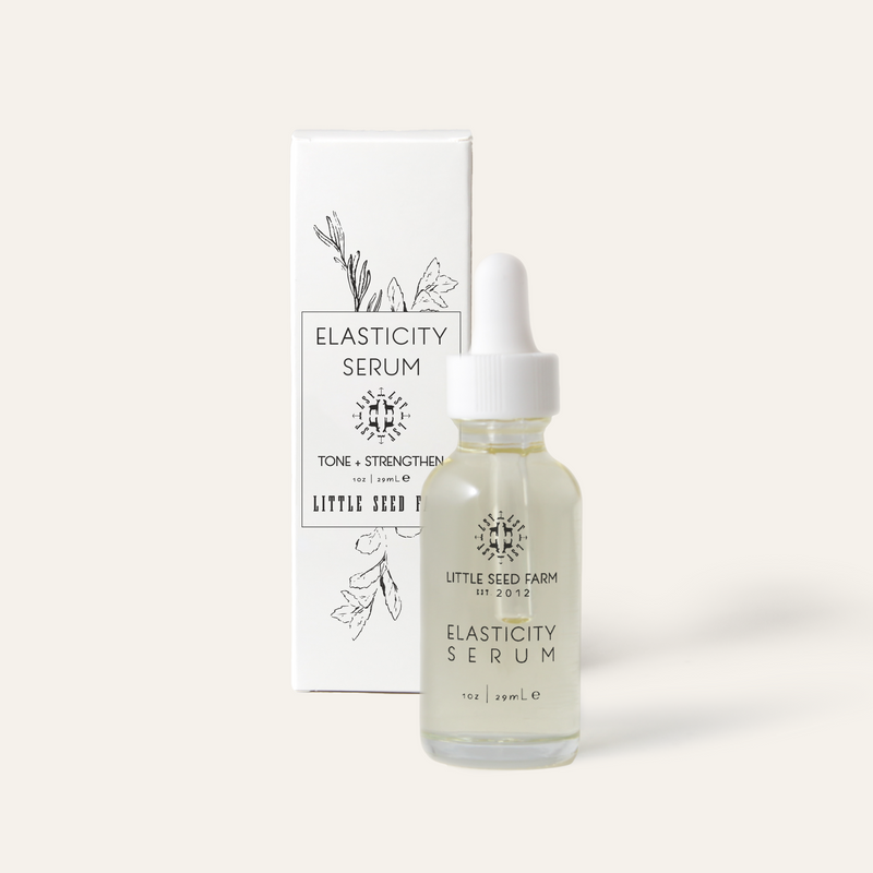 Little Seed Farm | Elasticity Serum bottle, featuring a blend of organic essential oils, designed to enhance skin elasticity and nourish for a glowing complexion.
