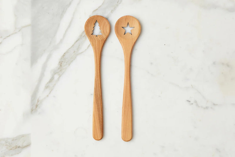 etúHOME | Euro Holiday Spoon Set, Beechwood: Two long-handled wooden spoons with festive star and tree cutouts, perfect for holiday cooking and gifting from Athens Cooks.
