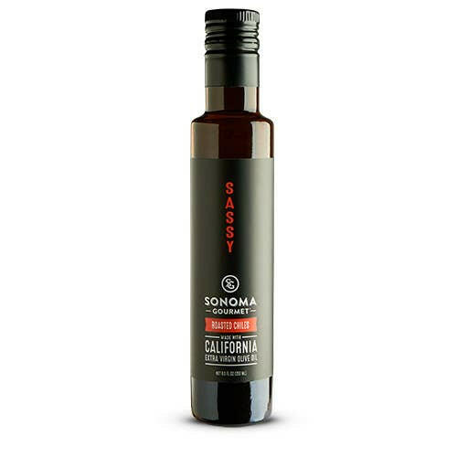 Sonoma Gourmet Roasted Chiles EVOO bottle, highlighting its robust flavor, perfect for enhancing dishes with its spicy, cold-pressed California extra virgin olive oil.