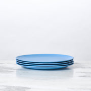 Stack of Fable New York's eco-friendly, 5.5-inch bamboo cereal bowls, part of the illustrated collection, perfect for serving meals sustainably.