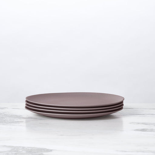 Fable New York Bamboo Salad Plates (Set of 4) - Castle, stacked on a marble surface; durable, eco-friendly, ideal for salads or desserts.