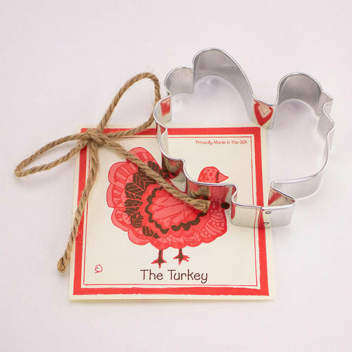Ann Clark | Fall Gift Cookie Cutters - Turkey -4 includes a woman-shaped metal cutter and a recipe card with decorating tips for creative baking.