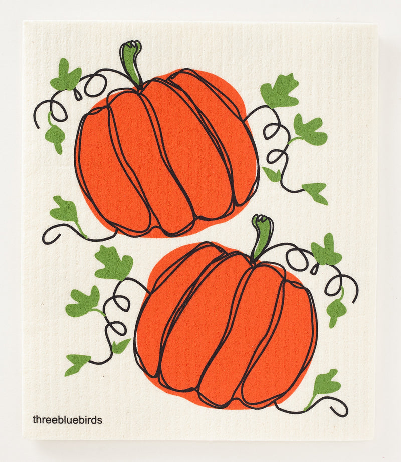 Three Bluebirds Swedish Dishcloths featuring pumpkin design; eco-friendly, absorbs 20x its weight, replaces paper towels, biodegradable, ideal for cleaning various surfaces.