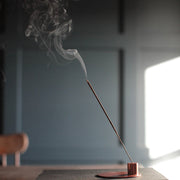 The Floral Society | SAMPLE Essential Oil Incense with smoke rising, designed for mood enhancement, handcrafted with therapeutic-grade oils.