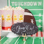 Hester & Cook | Tailgate Collection - Die Cut Football Place Mat, perfect for festive gatherings, enhances your table with a spirited, sporty vibe.