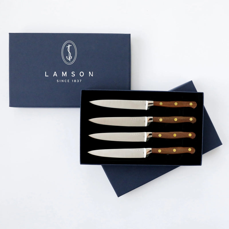 Lamson 5 Premier Forged Steak Knives, Set of 4 - Walnut - Serrated, showcasing premium German steel blades with elegant walnut handles in a gift box.