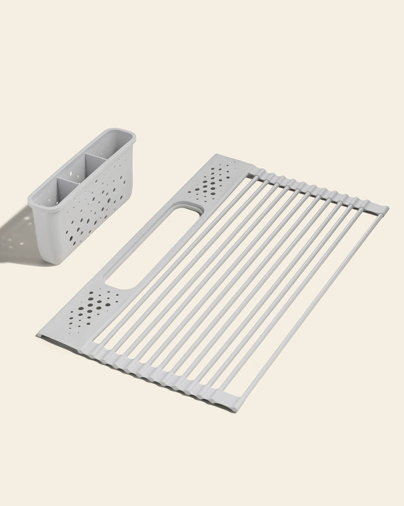 GIR | Over-the-Sink Drying Rack - Studio White, a white plastic dish rack with holes, designed for efficient kitchen use.