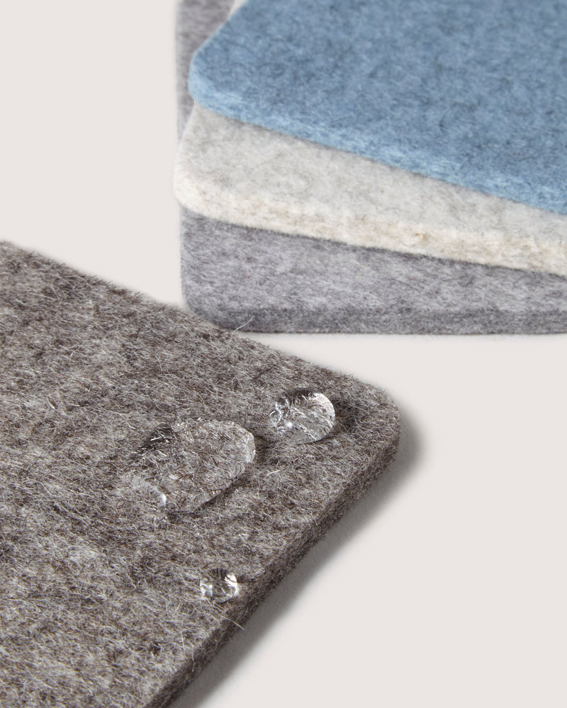 Graf Lantz | Bierfilzl Merino Wool Square Coaster Multi 4 Pack showcasing water-repellent surface on felt, ideal for stylish and functional home use.