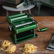 Marcato | Atlas 150 Pasta Maker (Ice) with manual crank and adjustable dial, designed for rolling and cutting homemade pasta like lasagne and fettuccine.