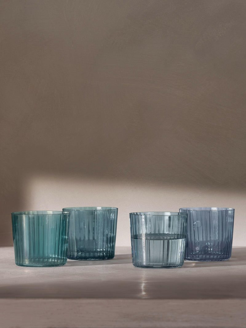 Set of four LSA International Gems Tumblers, 19oz each, with fluted texture and hand-painted, gemstone-inspired design, perfect for both casual and formal dining occasions.