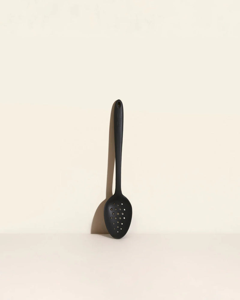 GIR Get It Right - GIR Perforated Spoon: Black, features a branching hole pattern for straining, a deep bowl, and a seamless, hygienic unibody design.