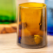 Moroccan Cone Glassware Small - Amber - Set of 6, featuring hand-blown cone-shaped glasses with visible bubbles, perfect for beverages or as decorative vases.