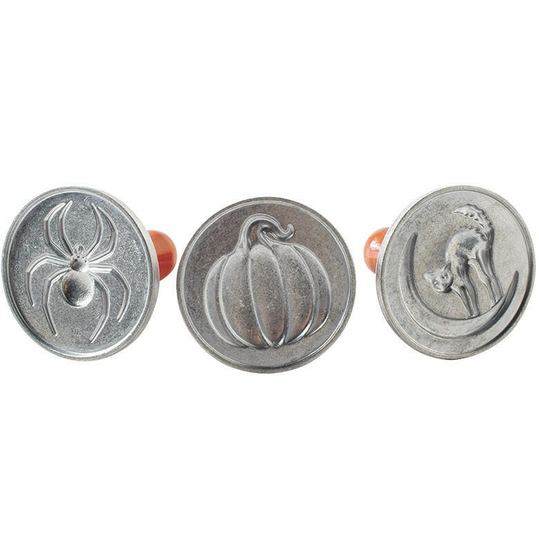 Nordic Ware Halloween Cookie Stamps - Cat: Silver stamps with orange handles, featuring spider, pumpkin, and cat designs for creating festive cookie imprints.