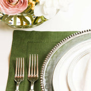 Crown Linen Designs | Hemstitch Placemat - Evergreen showcased with a close-up of the elegant hemstitch pattern, enhancing any dining setting with sophisticated detail.