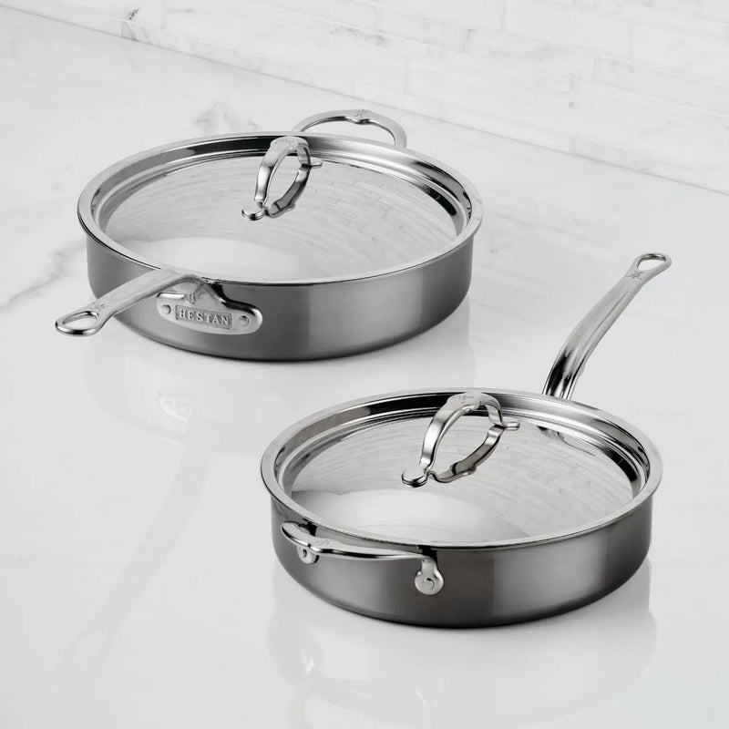 Hestan | Cookware, 3.5qt Sauté Pan + Lid on white surface, showcasing ergonomic handles and durable titanium-enhanced construction, ideal for versatile cooking in Athens Cooks' curated collection.
