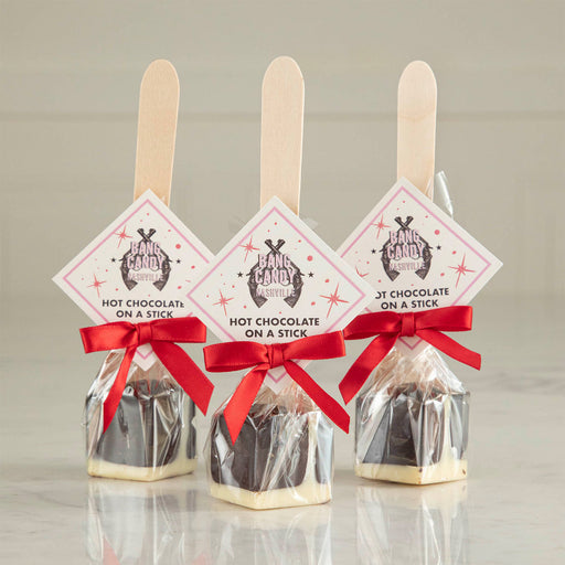 Bang Candy | Hot Chocolate on a Stick - Red, featuring premium Belgian chocolate molded on a spoon, ideal for creating rich hot chocolate with ease.