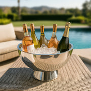 Final Touch | Double-Wall Beverage Bin on woven table, holding chilled wine and Champagne bottles, ready for outdoor entertaining, showcasing stainless-steel elegance and practicality.