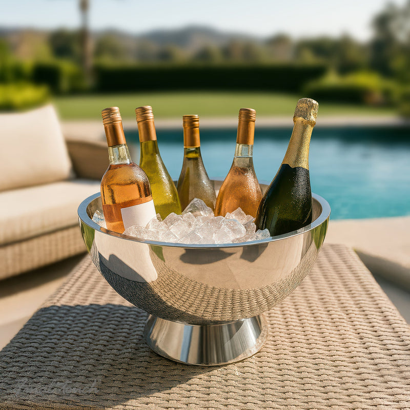 Final Touch | Double-Wall Beverage Bin on woven table, holding chilled wine and Champagne bottles, ready for outdoor entertaining, showcasing stainless-steel elegance and practicality.