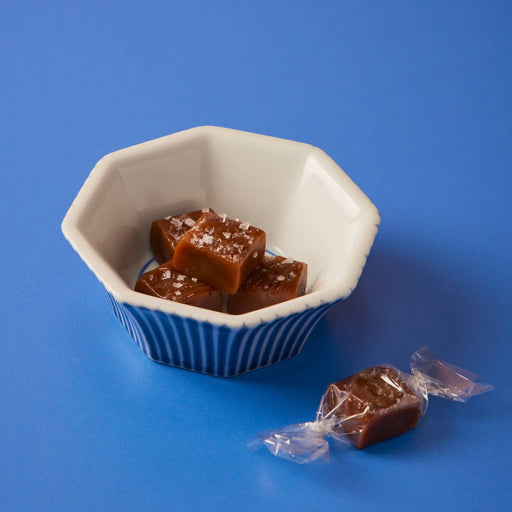 Le Bon Garçon | Individual Caramels - Classic Sea Salt: Close-up of velvety caramel candies, highlighting their luxurious texture and craftsmanship rooted in French culinary tradition.