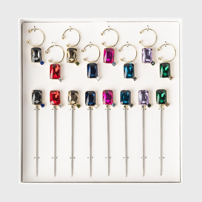 Joanna Buchanan Party Set of Cocktail Picks and Wine Charms displayed in a box, featuring various gem designs.