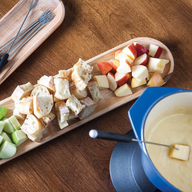 J.K. Adams Maple Appetizer Tray with fondue setup; includes baguette cubes, apple pieces, and fondue fork in cheese, showcasing elegant entertaining essentials from Athens Cooks.