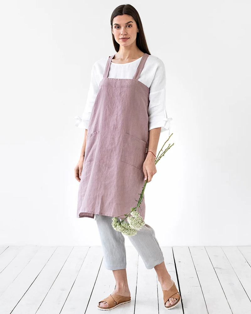 MagicLinen Japanese Cross-Back Linen Apron L-XL in Woodrose, featuring durable fabric and two side pockets for cooking or gardening.