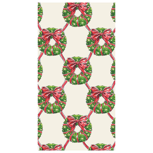 Hester & Cook Guest Napkin - Holiday Wreath features a pattern of green wreaths with red bows, perfect for festive gatherings.