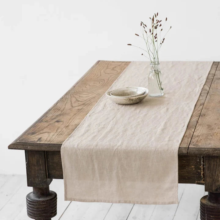 MagicLinen Christmas Collection linen table runner, 16 x 79, featuring vibrant red gingham, enhances festive dining with warmth and elegance.