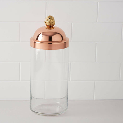 Close-up of Ruffoni large kitchen jar with a clear glass body and copper lid, designed for storing dry goods and enhancing countertop aesthetics.