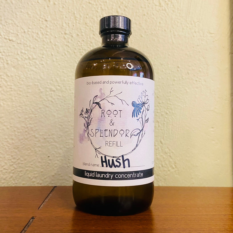Root & Splendor Laundry Concentrate in a 16 oz amber glass bottle, showcasing sustainable, plant-based ingredients and refillable design, ideal for eco-conscious laundry care.