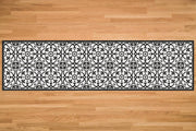 Etú HOME | Liberty L Italian Kitchen Sink Floor Mat (24x47) showcases a black geometric pattern on a white vinyl runner, ideal for stylish, functional kitchen use.