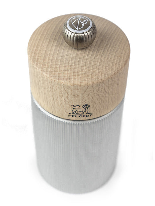Peugeot | Line Salt Mill Aluminum + Beechwood, Natural, 7 inches, featuring a fluted aluminum body and wood top with Peugeot lion logo, ideal for kitchen use.