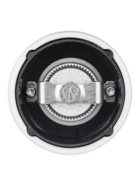 Peugeot | Line Pepper Mill Aluminum + Beechwood, 4.75 Inches, featuring a close-up of the durable burr-grinding mechanism, showcasing its precision craftsmanship.