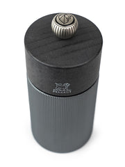 Peugeot | Line Pepper Mill Aluminum + Beechwood, Carbon, 4.75 inches features ridged design with Peugeot lion logo and adjustable knob, perfect for culinary enthusiasts.