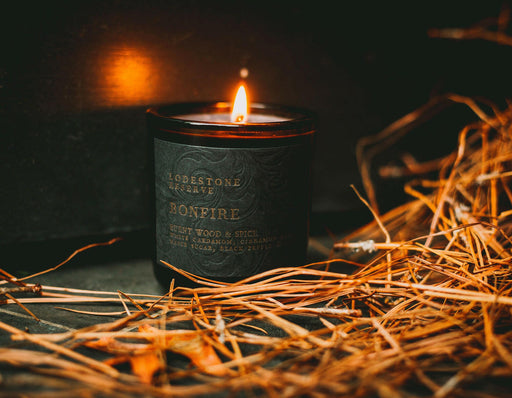 Lodestone | Luxury Soy Candles - Bonfire, depicted with a close-up of a flickering flame, capturing warmth and elegance, echoing the essence of Maryland’s Eastern Shore.