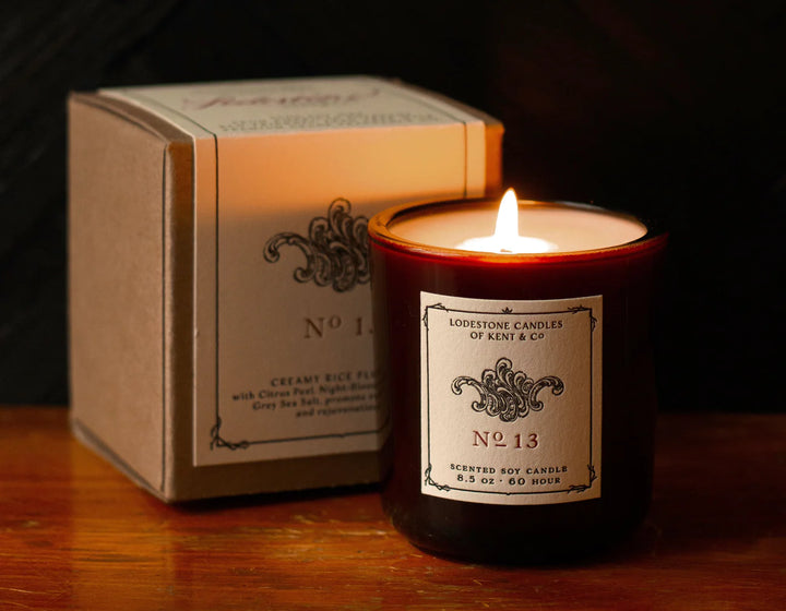 Lodestone | Luxury Soy Candles - No. 13 shown in a jar with its box, featuring elegant label details. Perfect for a cozy, sophisticated ambiance.