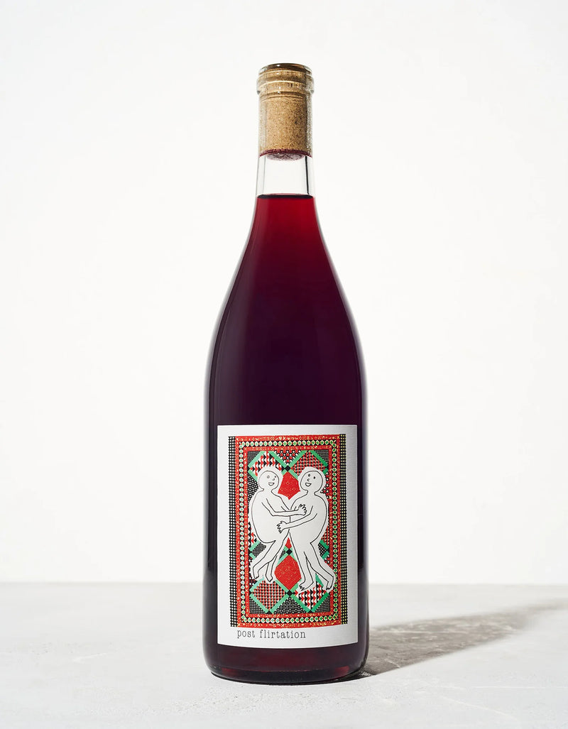 2023 Martha Stoumen Post Flirtation Red wine bottle with a geometric label, featuring two embracing figures, ideal for sharing at kitchen gatherings.