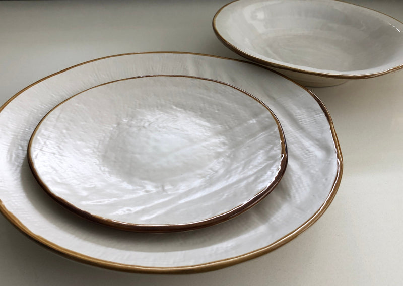 Novita | Mediterranean Stoneware Dinner Plates - Gray, showcasing a hand-dipped, unique texture with slight variations, ideal for mixing and matching in elegant table settings.