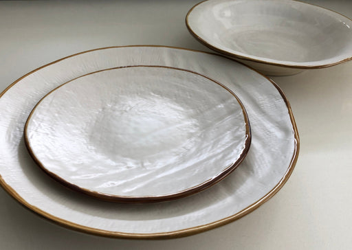 Novita | Mediterranean Stoneware Dinner Plates - Gray, showcasing a hand-dipped, unique texture with slight variations, ideal for mixing and matching in elegant table settings.