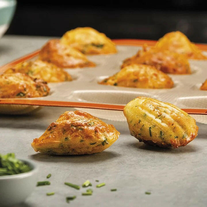 Silpat Reusable Silicone Baking Molds - Tartelette Mold, featuring 12 holes for perfectly shaped pastries, ideal for baking enthusiasts seeking durable, non-stick bakeware.